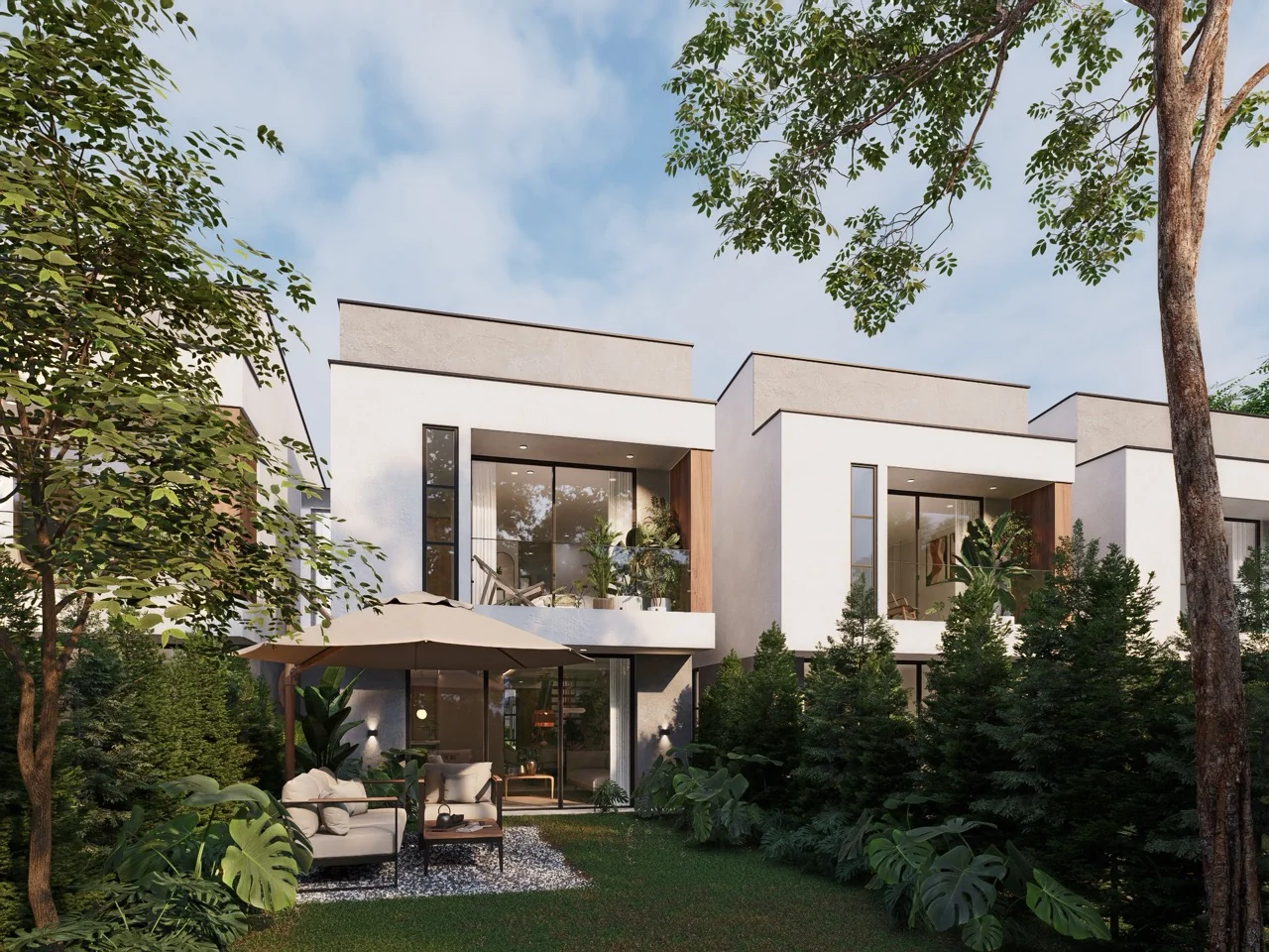 Fachada posterior con jardín privado